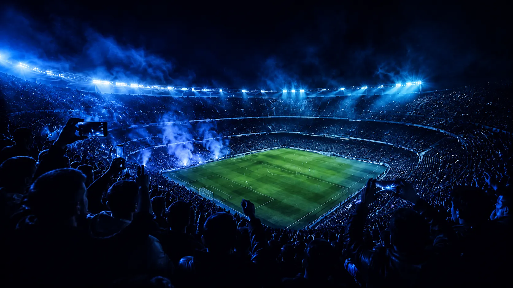 Stadium at night with floodlights and crowd